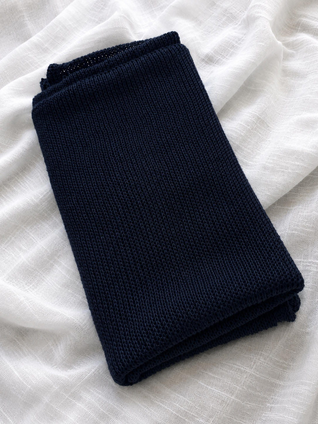 Deep Navy linen Infinity scarf folded to show fine knit structure