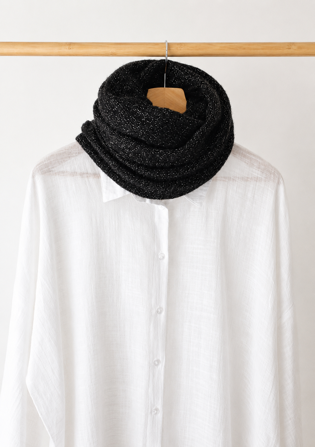 Black mohair infinity loop scarf styled with a white shirt showing effortless everyday wear