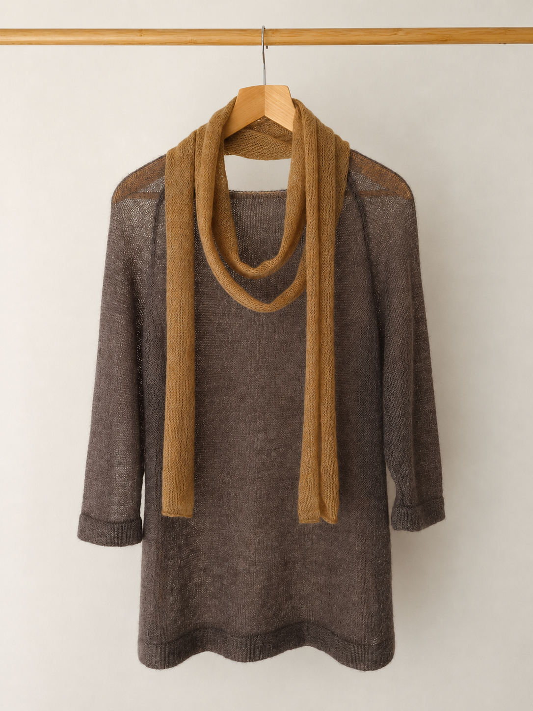 Warm Camel handmade skinny scarf styled with a knit sweater.