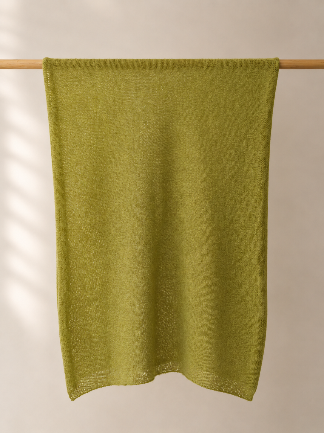 Full view of the Moss Olive silk mohair shawl hanging naturally