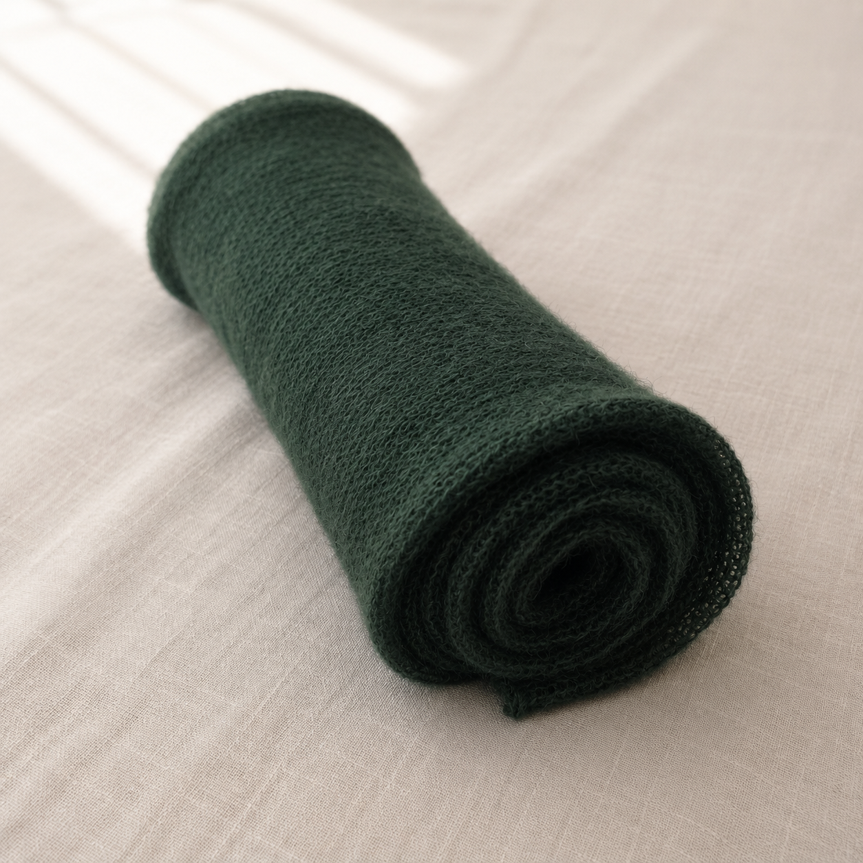 Rolled Deep Forest silk mohair shawl showing its soft lightweight knit texture