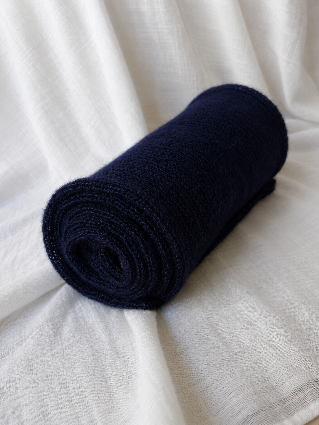 Rolled Midnight Navy Silk Mohair Shawl showing airy knit texture