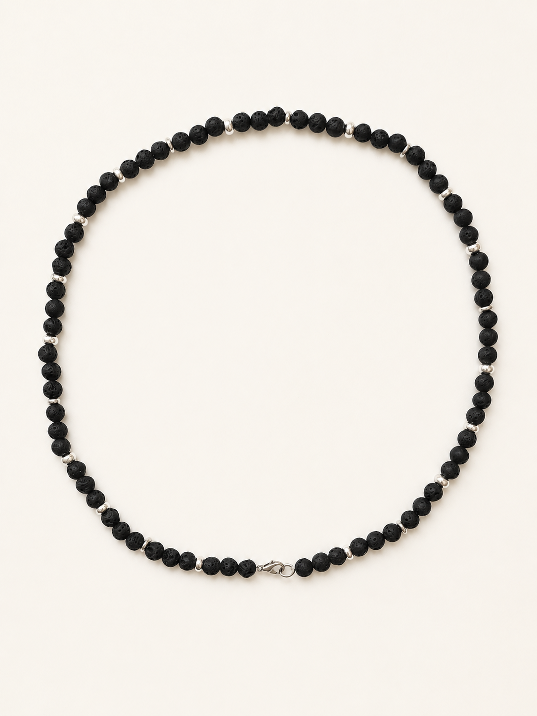 Black lava stone necklace with 6mm textured beads, silver accents and a stainless steel lobster clasp