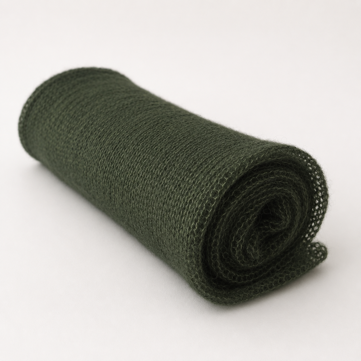 Rolled Moss Whisper silk mohair shawl highlighting its delicate knit and airy texture