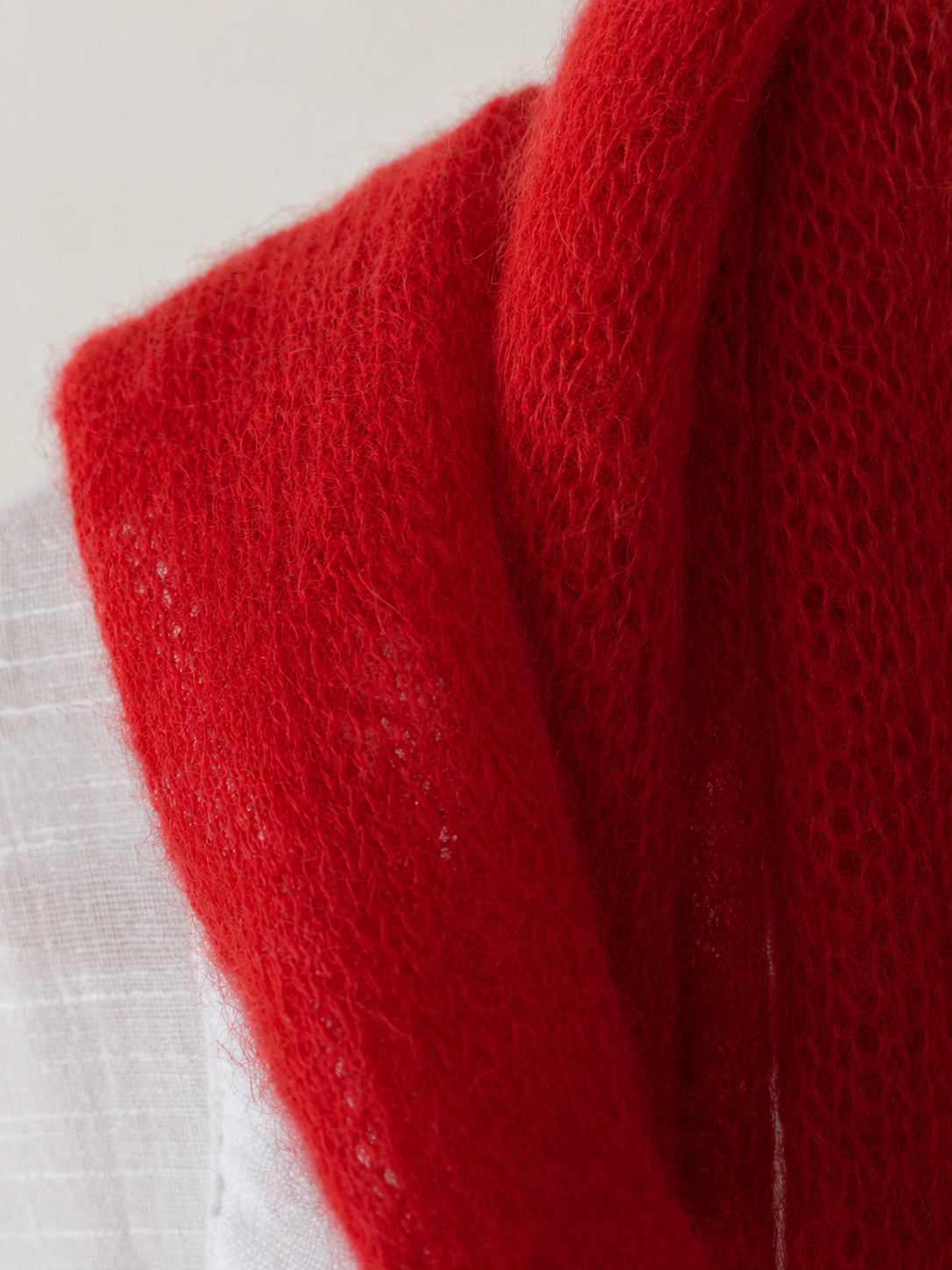 Close-up showing the delicate fluffy halo of natural kid mohair fibres.