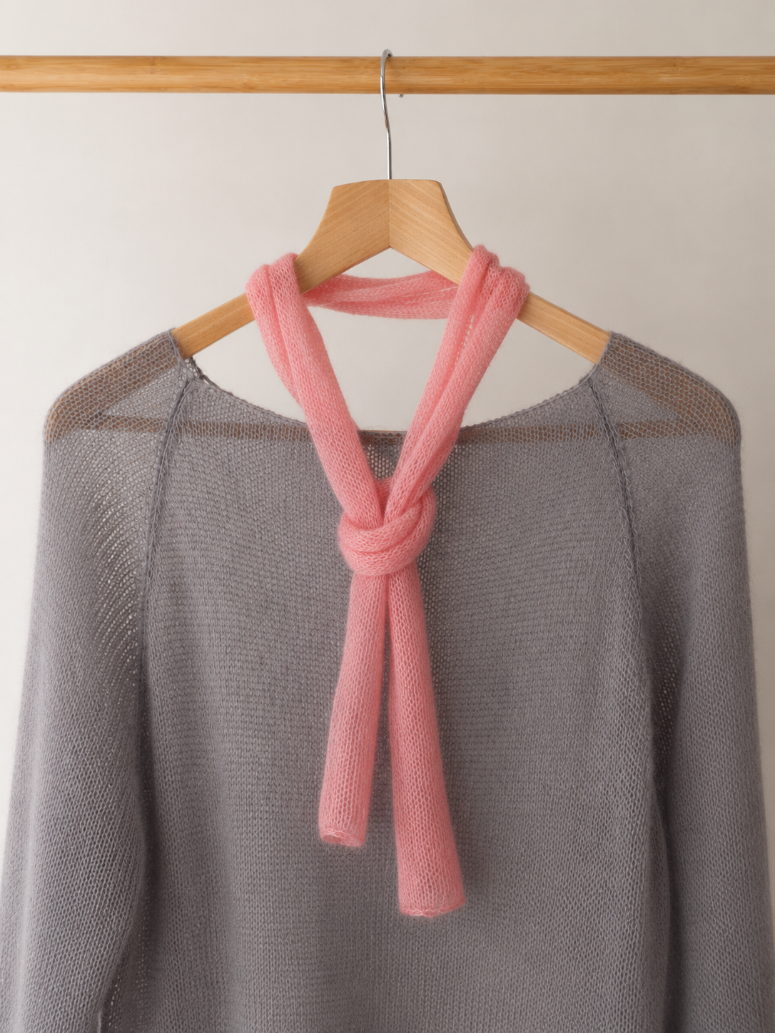 Blush Pink mini scarf styled in a loop over knitwear