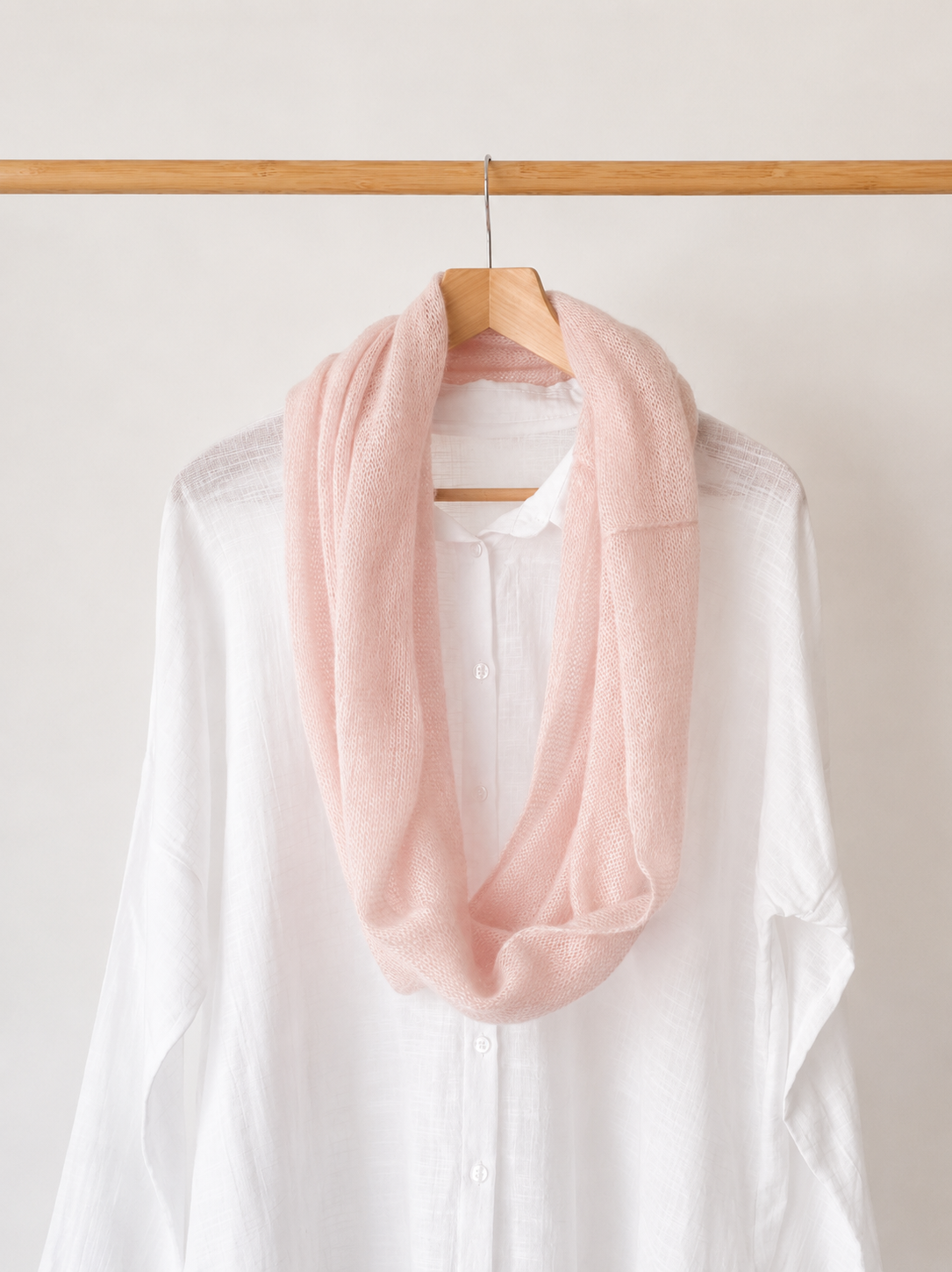 Blush Pink infinity scarf worn in a long loop style.