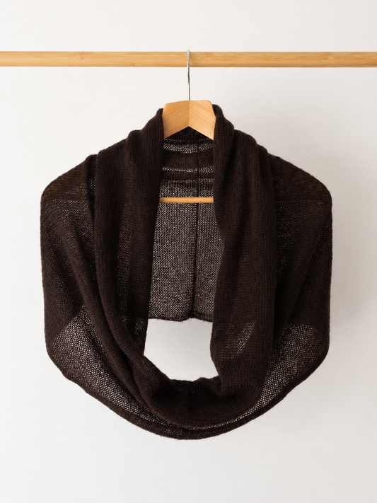 Dark Brown silk mohair infinity scarf hanging on a wooden hanger.