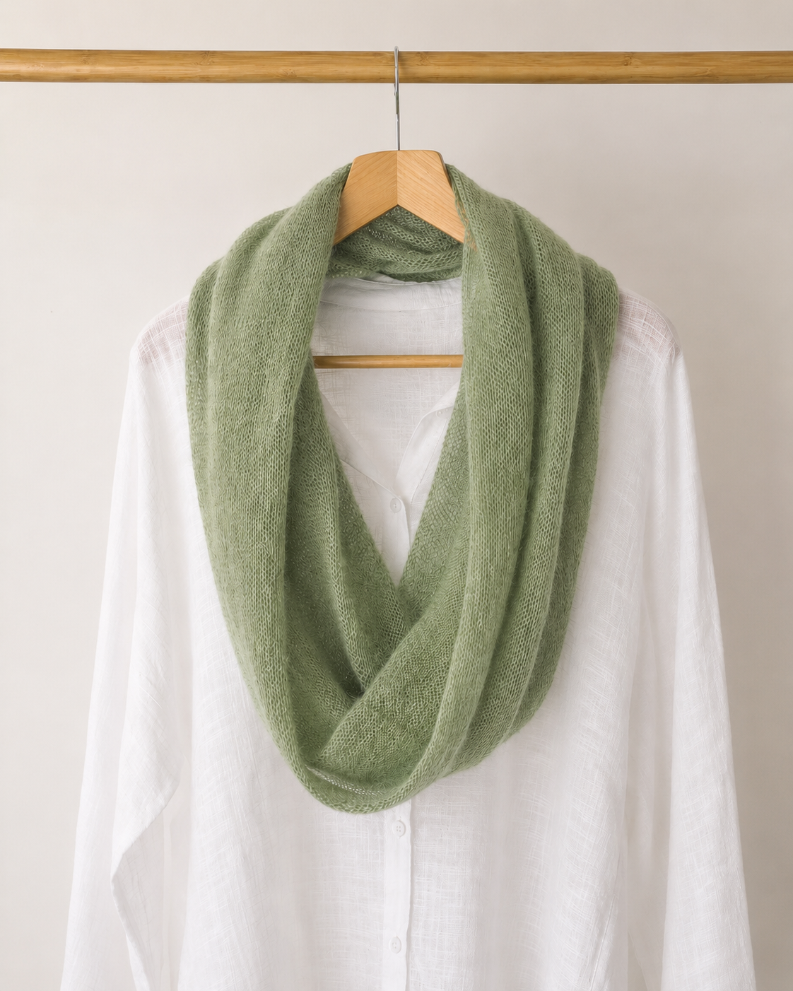 Soft Sage infinity scarf styled with a white linen shirt.
