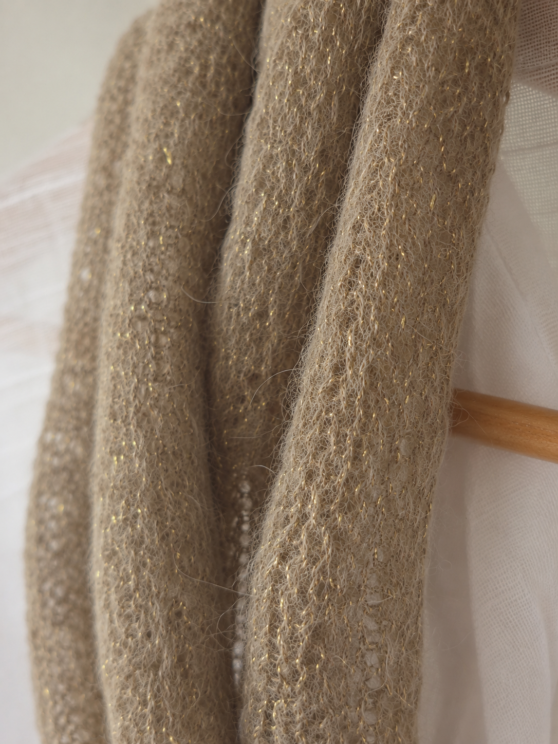 Macro detail of the subtle champagne gold shimmer.