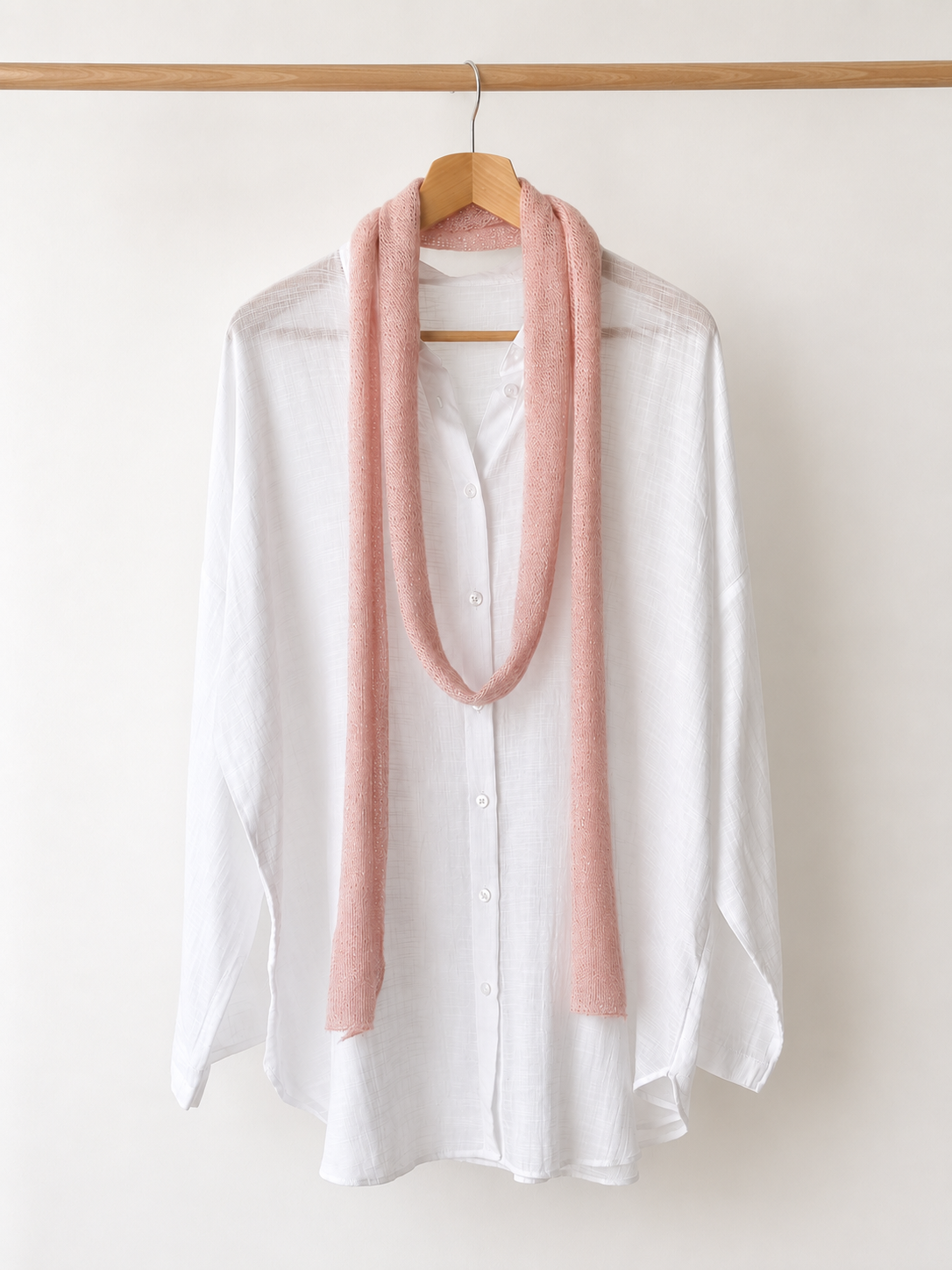 Blush pink extra long skinny mohair blend scarf on white linen shirt
