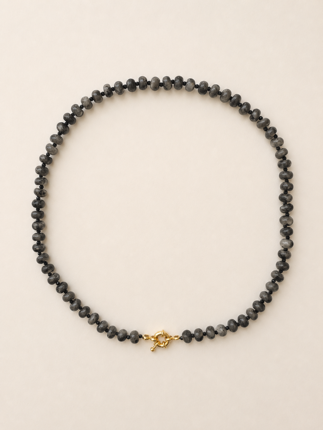 Labradorite rondelle necklace with black spinel accents and a golden spring ring clasp