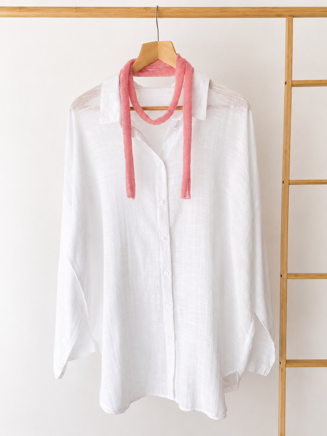 Blush Pink mini kid mohair skinny scarf on a white linen shirt