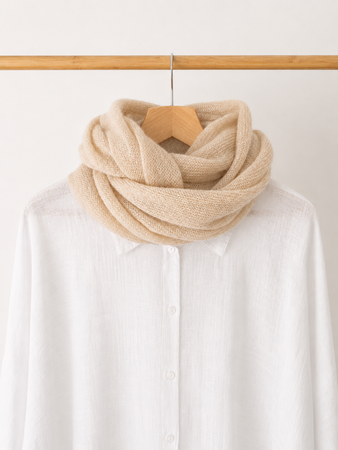 Light Champagne Infinity Scarf styled on a white linen shirt.