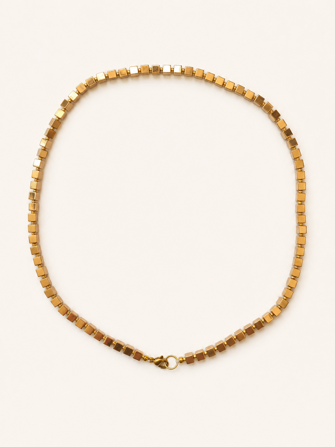 Gold hematite cube necklace with 4mm beads, Miyuki spacers and a stainless steel lobster clasp