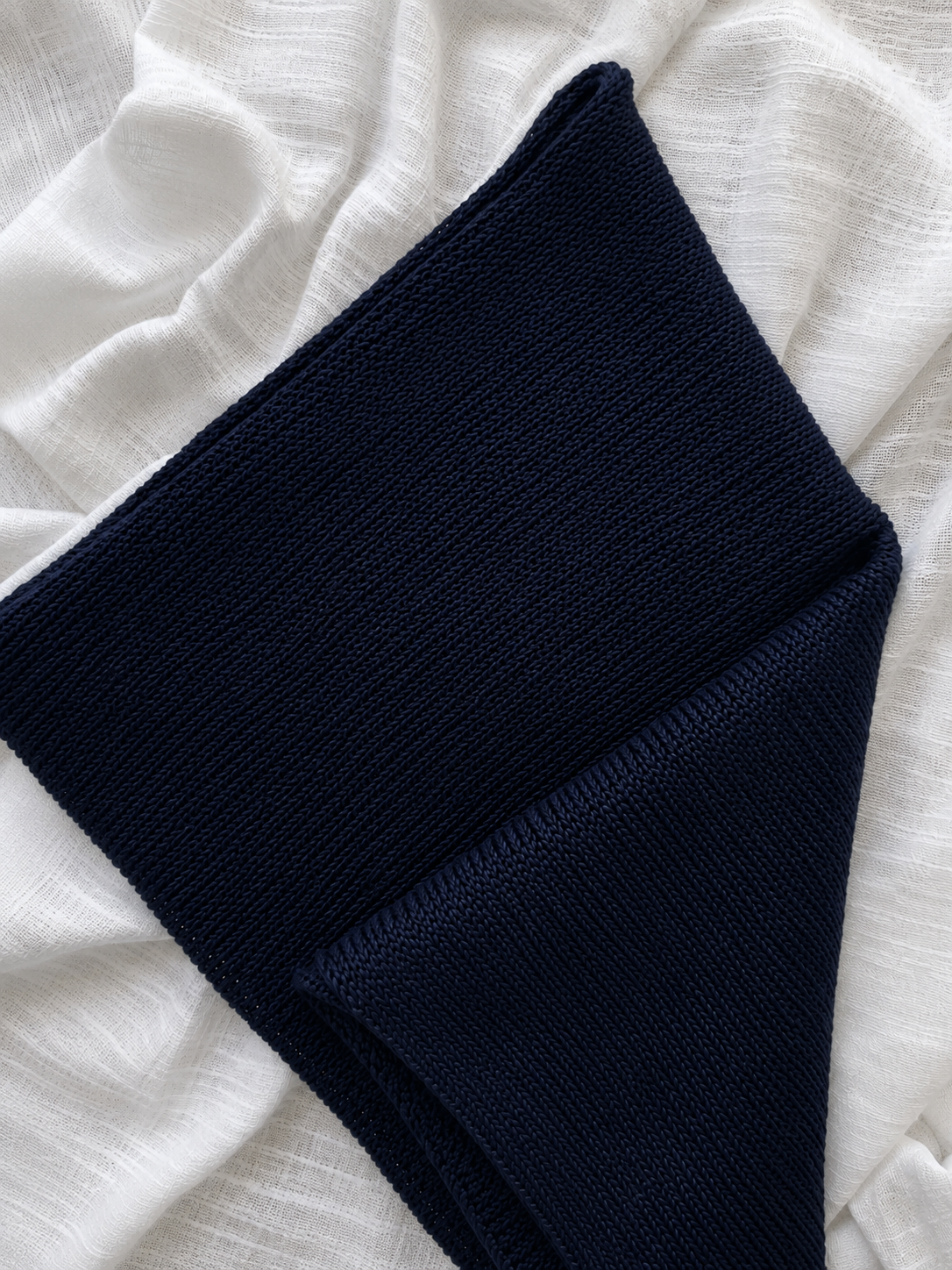 Close-up of Deep Navy knitted 100% linen Infinity scarf texture