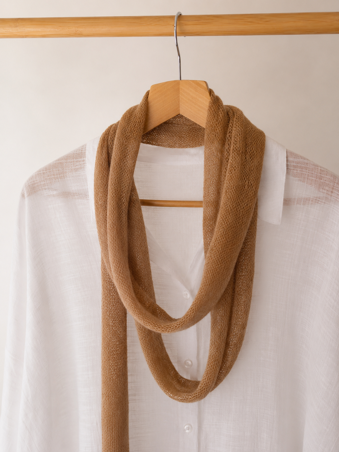 Close-up of Warm Camel kid mohair scarf showing its soft airy texture.