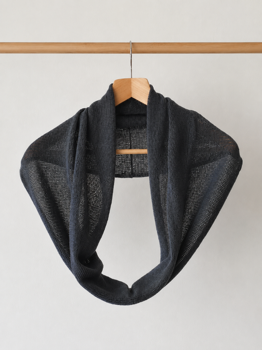 Charcoal Grey silky-feel linen blend infinity scarf hanging on a wooden hanger.