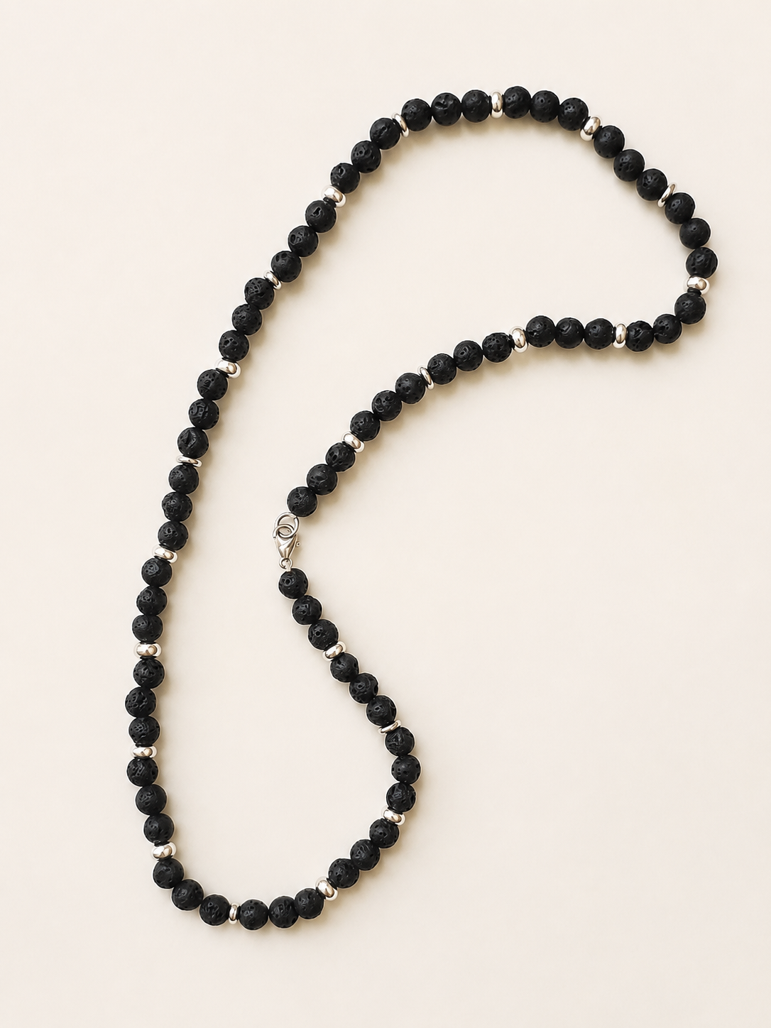 Full-length arrangement of a 51cm black lava stone necklace with silver accents