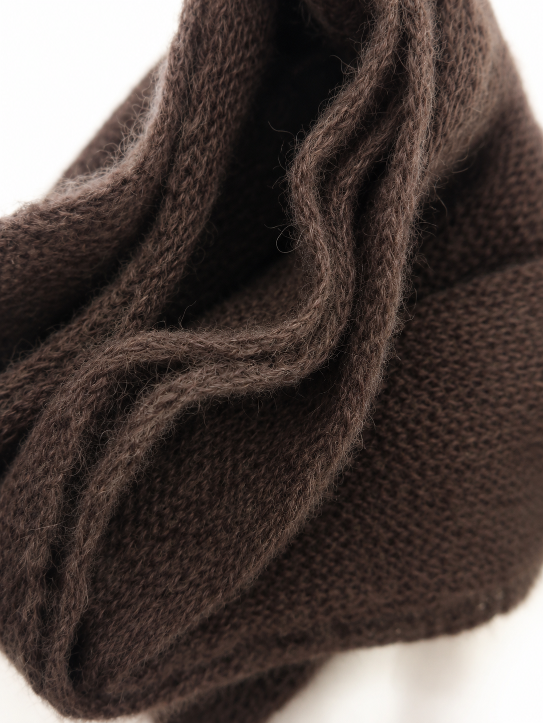 Close-up of the soft knit texture of the Dark Brown silk mohair infinity scarf.