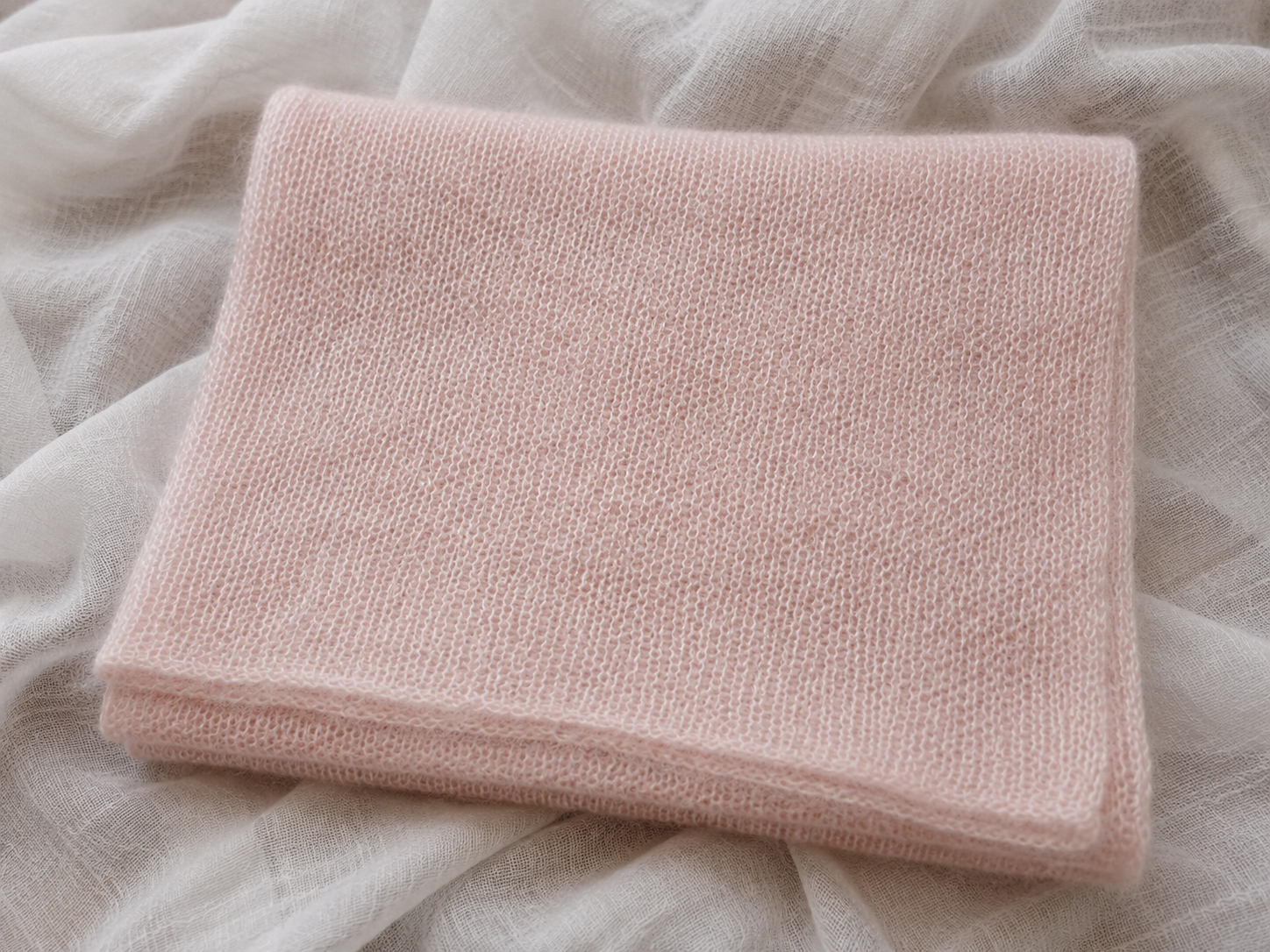 Close-up of the Blush Pink knit texture.