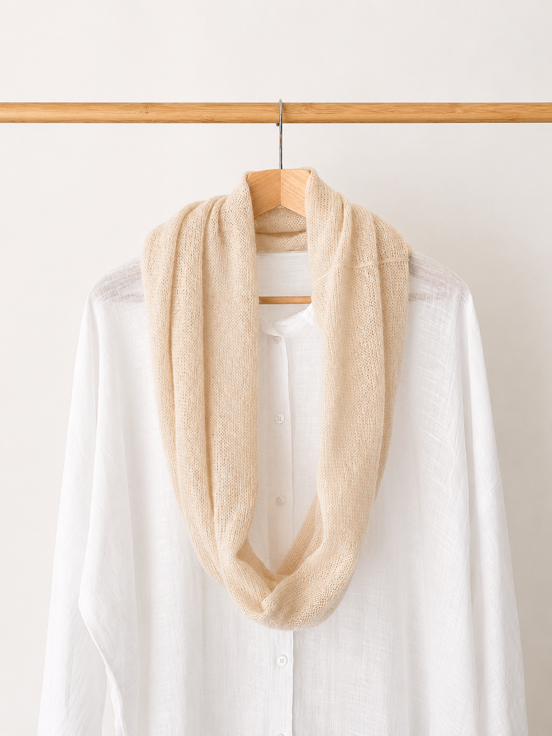 Light Champagne Mohair Blend Infinity Scarf worn with a white linen shirt.