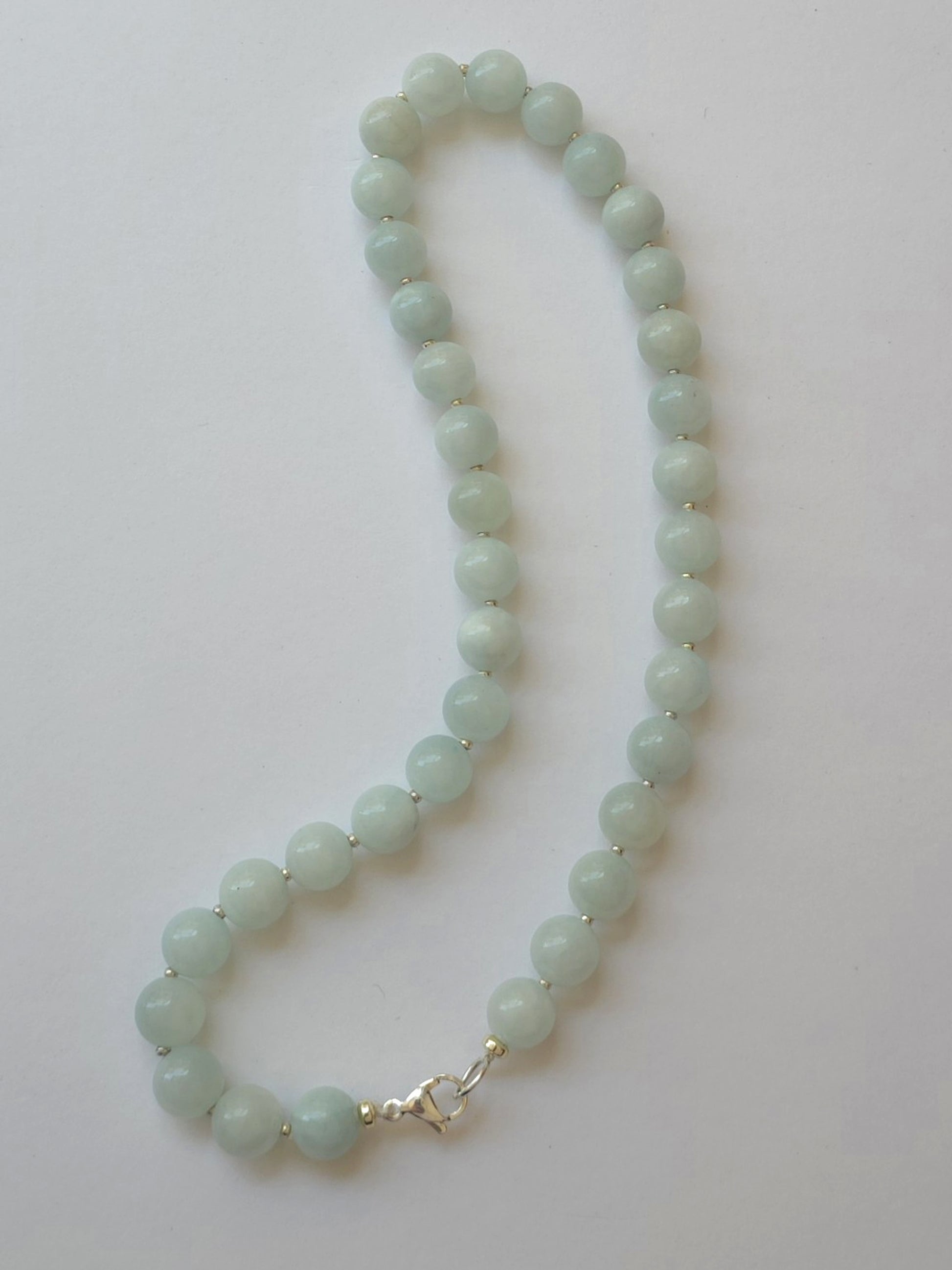 Full 42cm pale green jadeite necklace with stainless steel lobster clasp