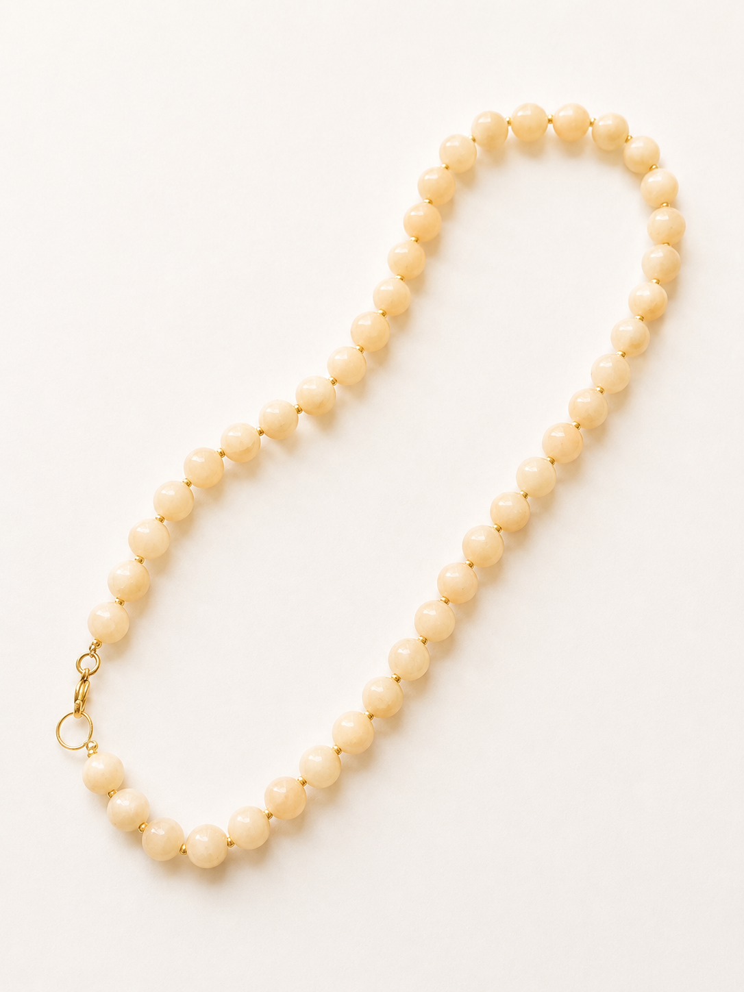 Full 42cm light peach jadeite necklace with stainless steel lobster clasp