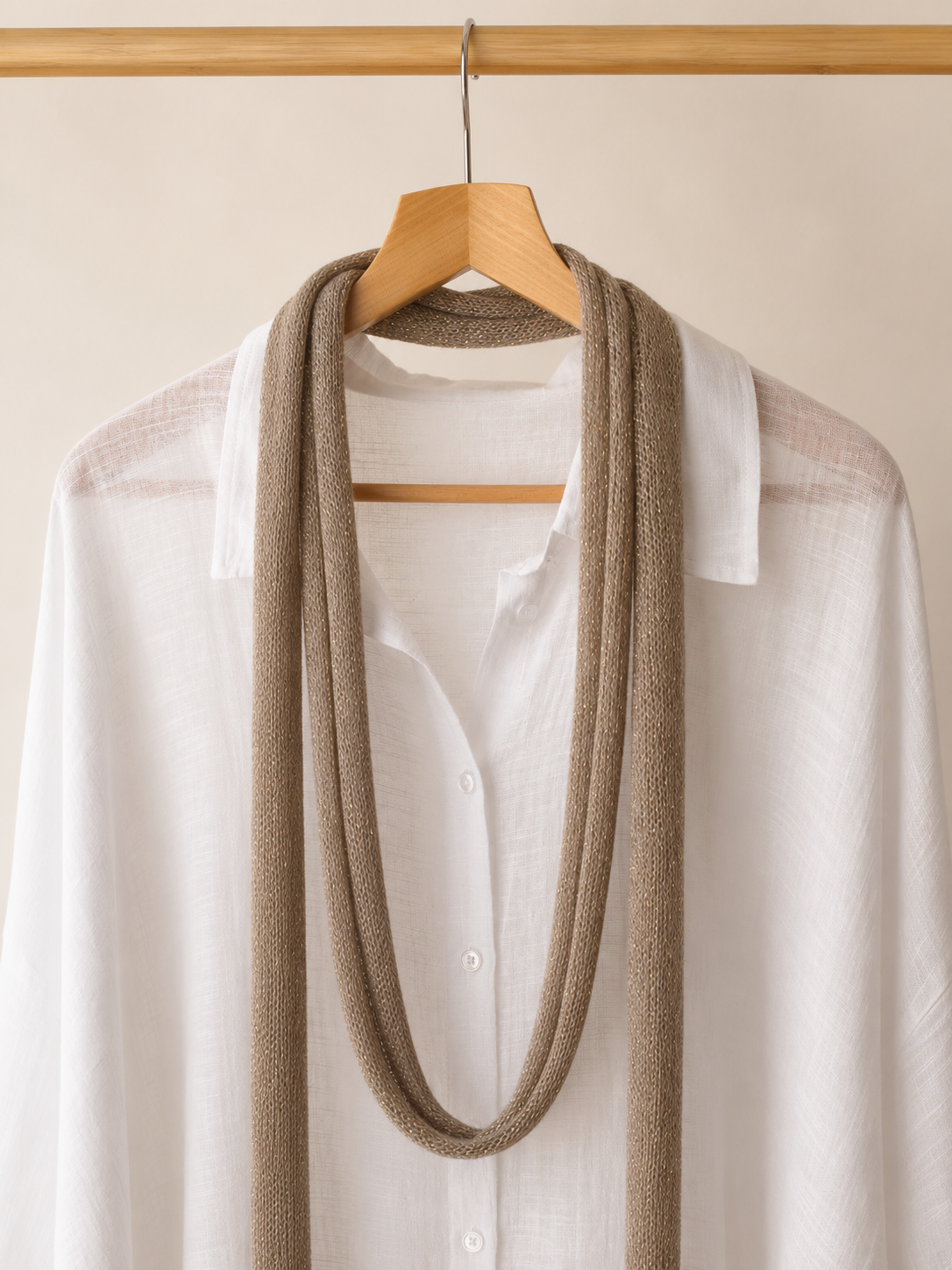 Handmade sand beige mohair scarf with delicate gold shimmer.